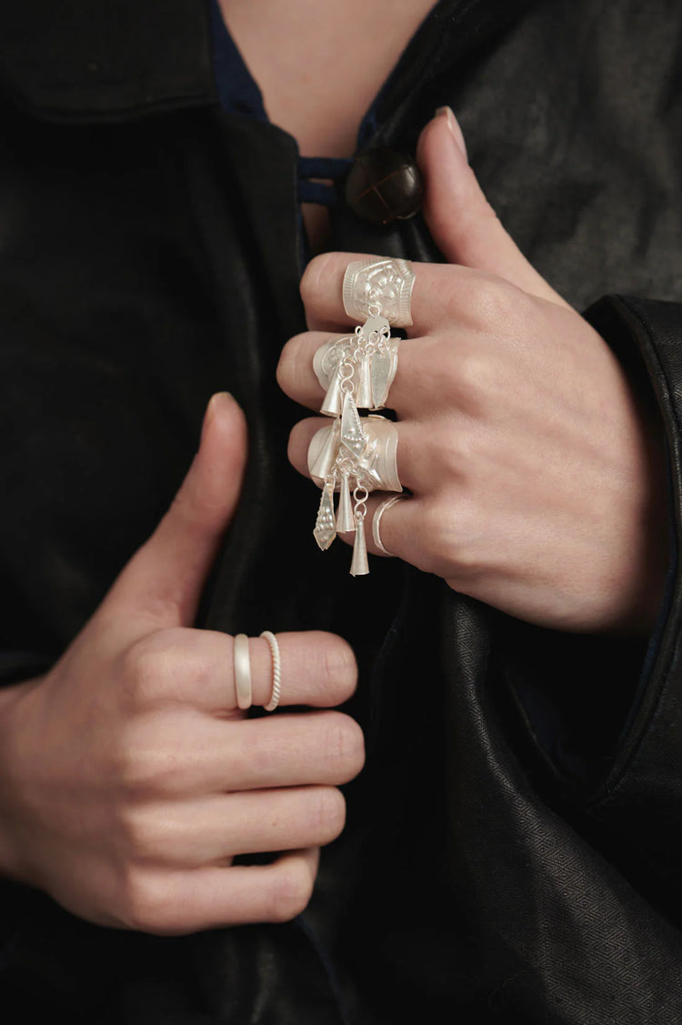 CUNZU| 穗SUI | Handmade silver ring with bell-shaped hangings and embossed bee pattern