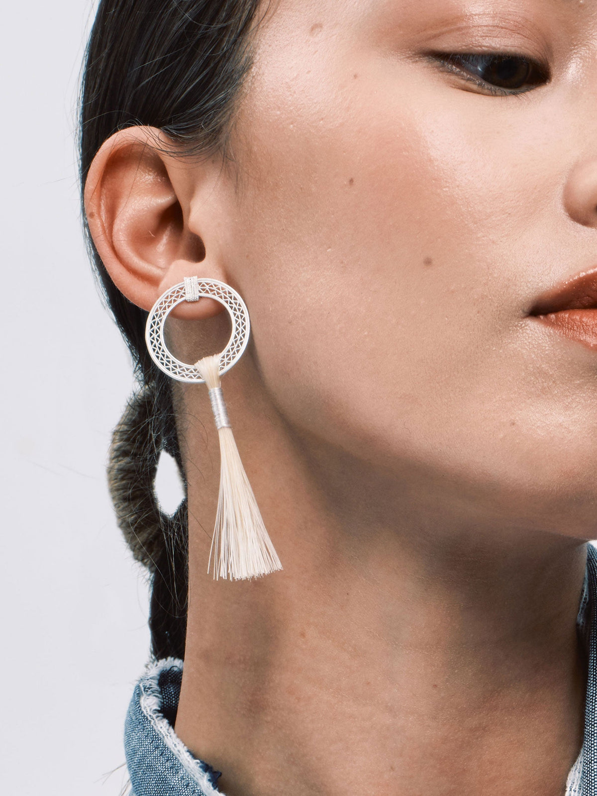 DISTANT HANDS Single Hoop Horsehair Earrings — official model photograph