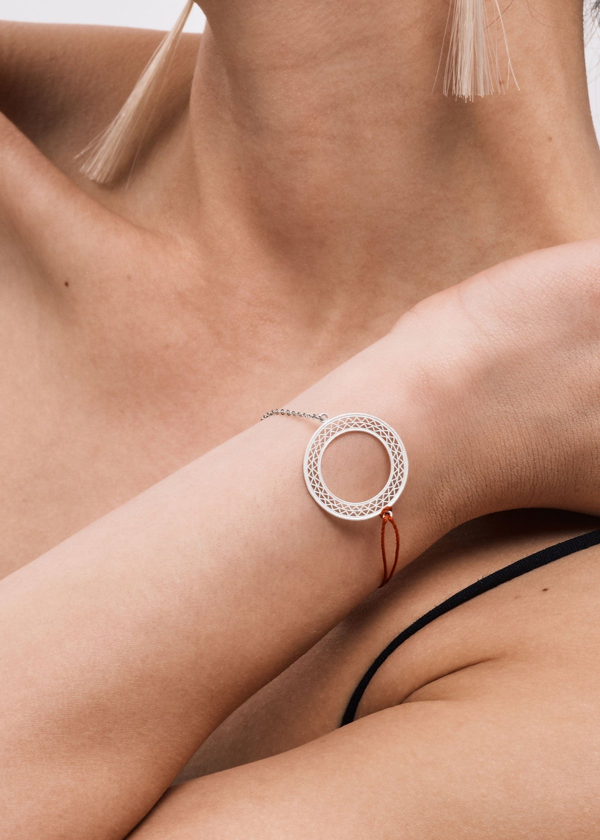 DISTANT HANDS Filigree Red String Bracelet — official model photograph