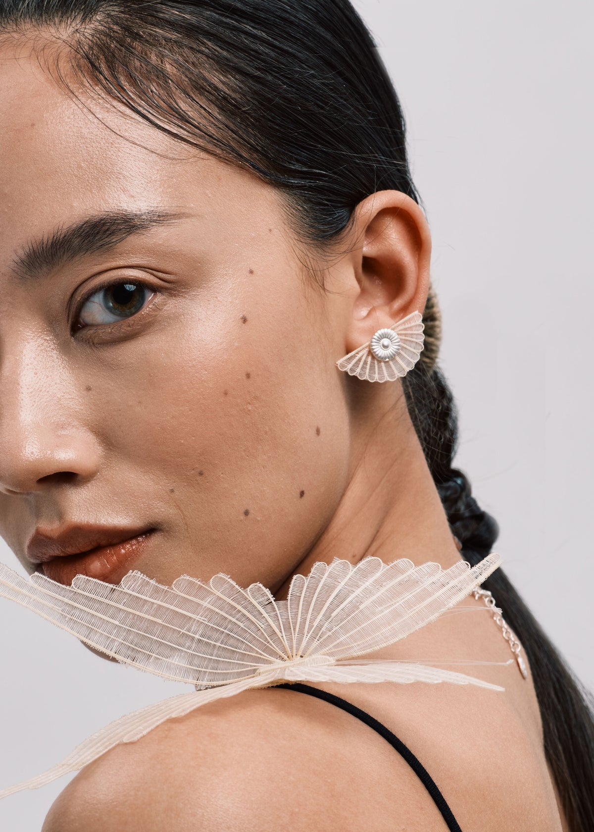 DISTANT HANDS Moon Horsehair Silver Earrings — official model photograph