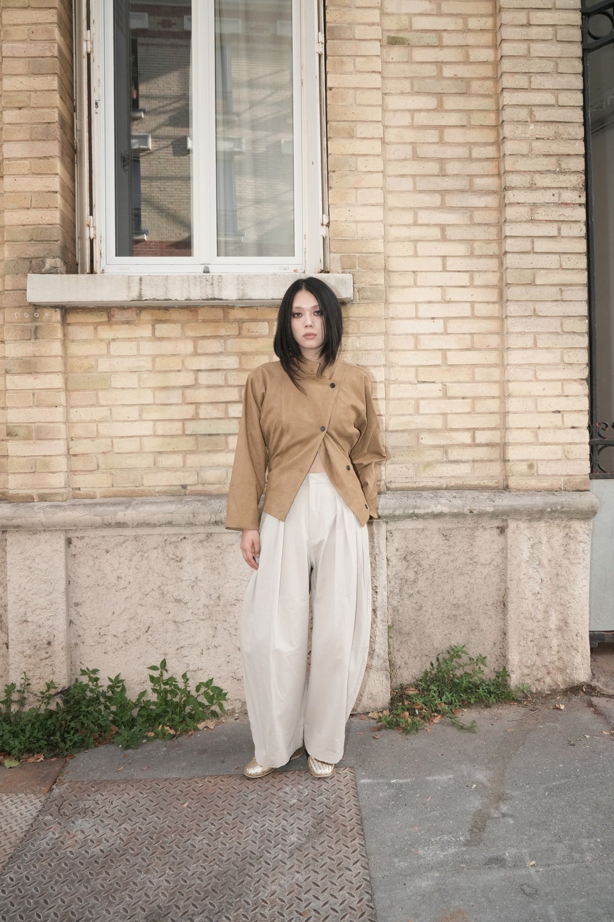 Beige AW26 Belted Stand-Collar Suede Jacket worn by a model