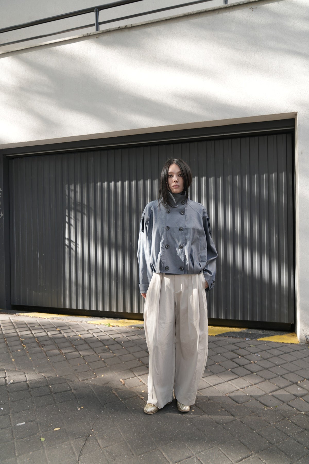 Blue AW26 Cropped High-Neck Double-Breasted Jacket worn by a model
