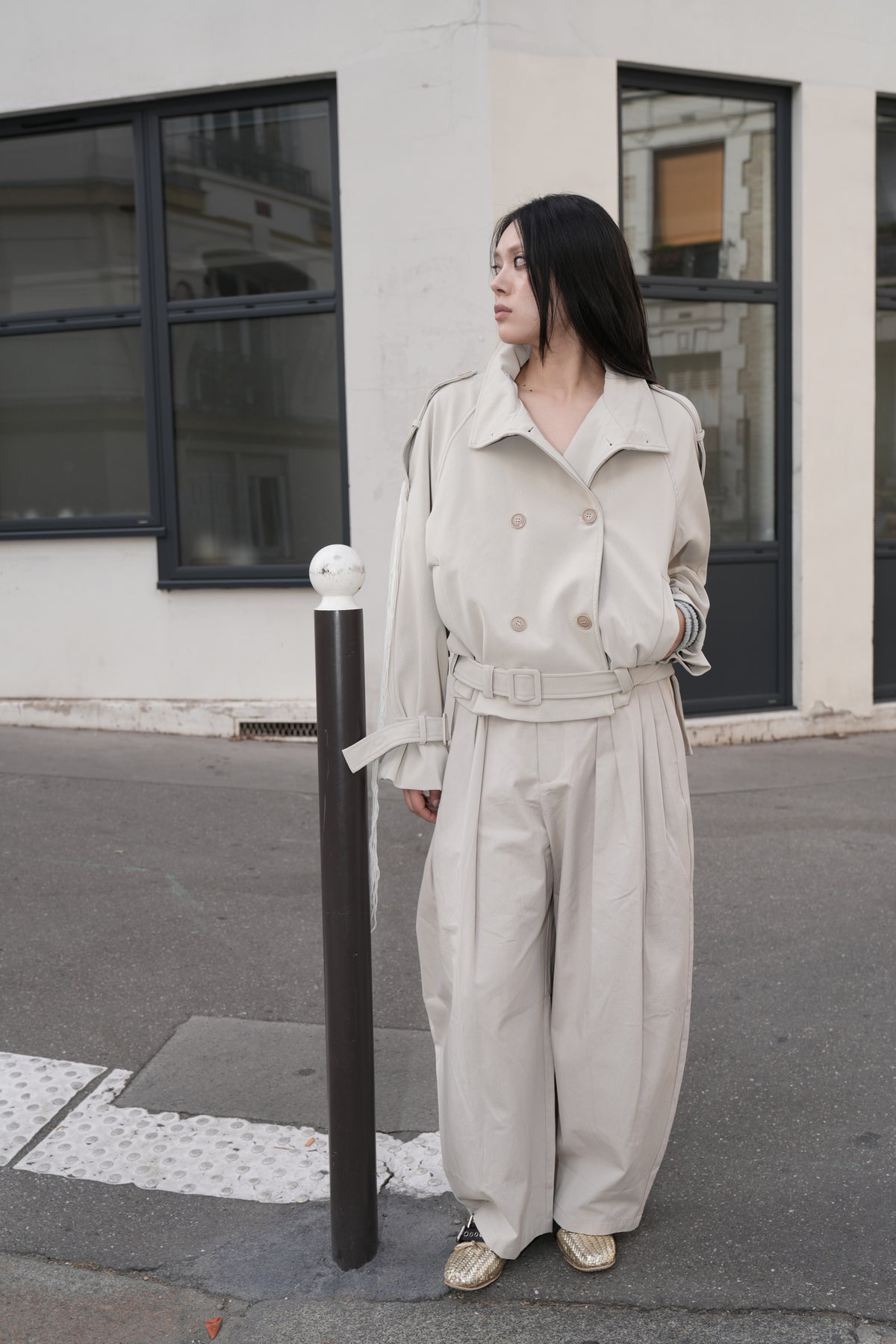 Cream Cropped Double-Breasted Trench Jacket worn by a model